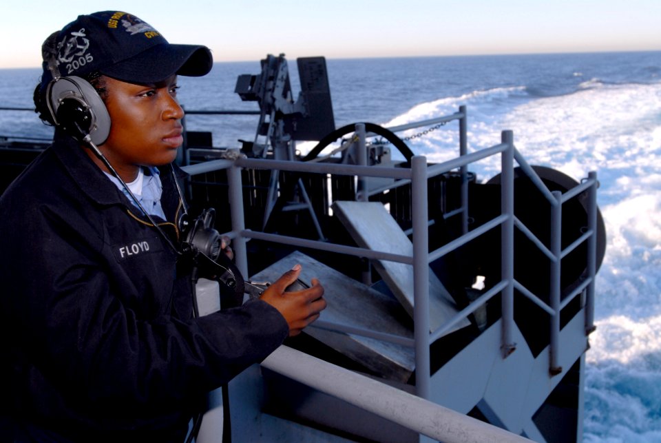 US Navy 061202-N-4133B-049 Seaman Wyshieka Floyd from Ashburn, Ga., stands lookout aboard USS Ronald Reagan (CVN 76)