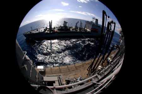 US Navy 061127-N-4207M-033 Military Sealift Command (MSC) fleet replenishment oiler USNS Pecos (T-AO 197) pulls alongside amphibious assault ship USS Essex (LHD 2) photo