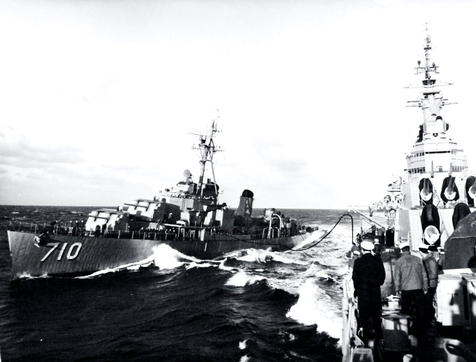 USS Gearing (DD-710) refueling from USS Newport News (CA-148) in the Mediterranean, in February 1952 (USN 708112)
