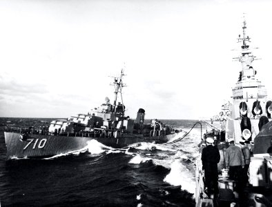 USS Gearing (DD-710) refueling from USS Newport News (CA-148) in the Mediterranean, in February 1952 (USN 708112)