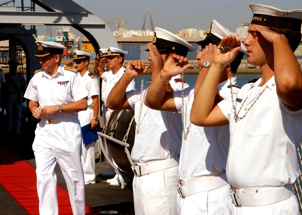 US Navy 061203-N-4205W-001 Deputy, Combined Forces Maritime Component Commander Royal Navy Commodore Keith Winstanley is piped aboard during the change of control ceremony for Combined Task Force 152