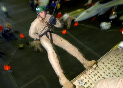 US Navy 061127-N-8907D-005 Navy Diver 1st Class John Doran with Explosive Ordnance Disposal Mobile Unit 6 (EODMU-6), Detachment 16, conducts repel and insertion training