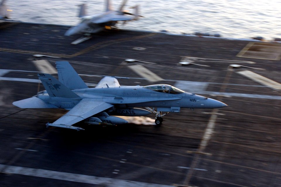 US Navy 061129-N-8907D-006 An F-A-18 Hornet assigned to the Wildcats of Strike Fighter Squadron One Three One (VFA-131) lands on the flight deck of the Nimitz-class aircraft carrier USS Dwight D. Eisenhower (CVN 6