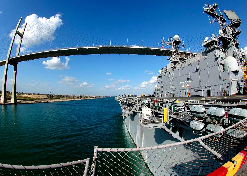 US Navy 061204-N-8547M-034 The amphibious assault ship USS Saipan (LHA 2) transits north in the Suez Canal after successfully completing her last surge deployment before decommissioning in April