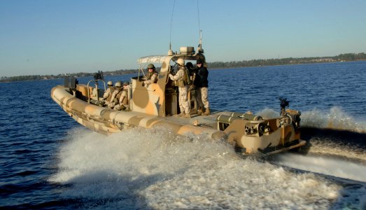 US Navy 061205-N-4097B-013 Sailors assigned to Riverine Squadron One (RIVRON-1) prepare for their final exercise and evaluations near Camp Lejeune, N.C