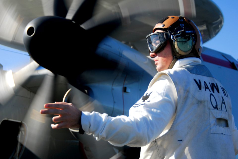 US Navy 061201-N-8158F-123 Aviation Electronics Technician 1st Class Corey Climber assigned to the Wallbangers of Carrier Airborne Early Warning Squadron One One Seven (VAW-117) mans a safety circle