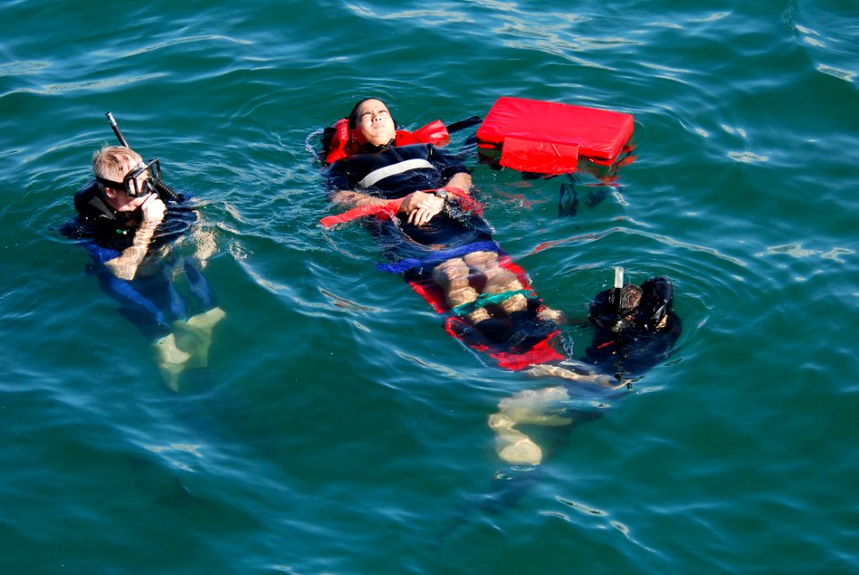 US Navy 061201-N-4774B-218 Sailors assigned to the Arleigh Burke-class guided-missile destroyer USS Russell (DDG 59) participate in a Search and Rescue (SAR) Limited Team Training exercise