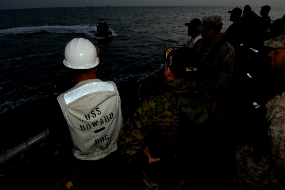 US Navy 061124-N-3642E-004 Secretary of the Navy (SECNAV) The Honorable Dr. Donald C. Winter prepares to depart guided-missile destroyer USS Howard (DDG 83) en-route to amphibious assault ship USS Boxer (LHD 4)