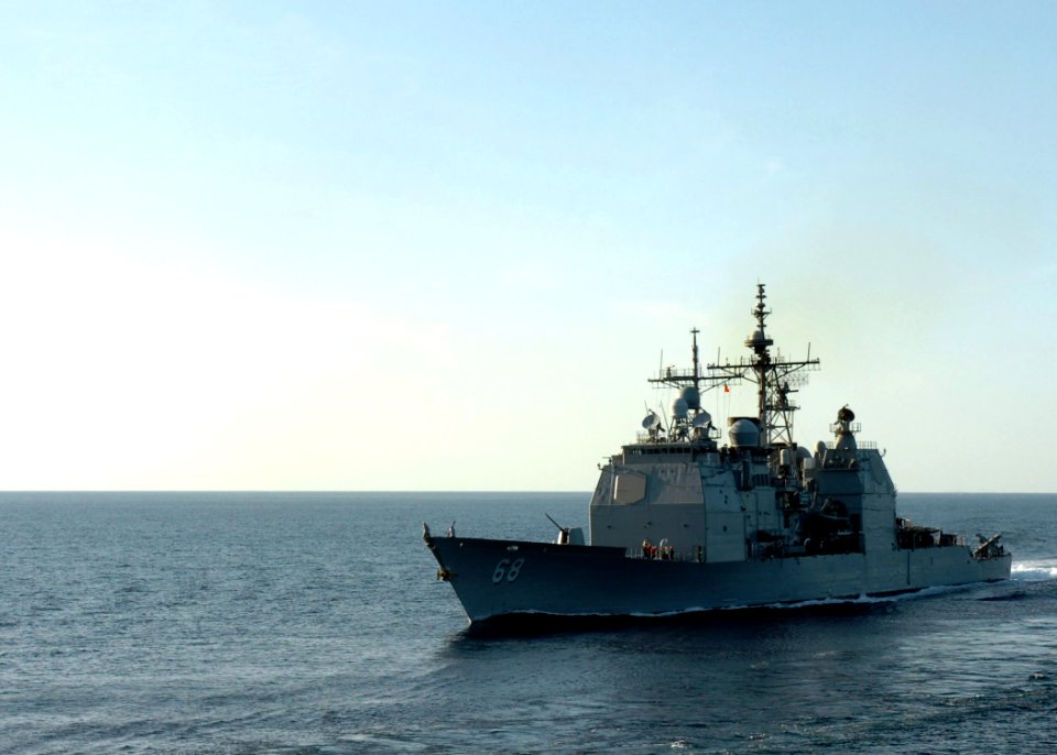 US Navy 061127-N-8907D-003 The Ticonderoga-class guided-missile cruiser USS Anzio (CG 68) pulls alongside the Military Sealift Command (MSC) underway replenishment oiler USNS Laramie (T-AO 204) to take on fuel and supplies