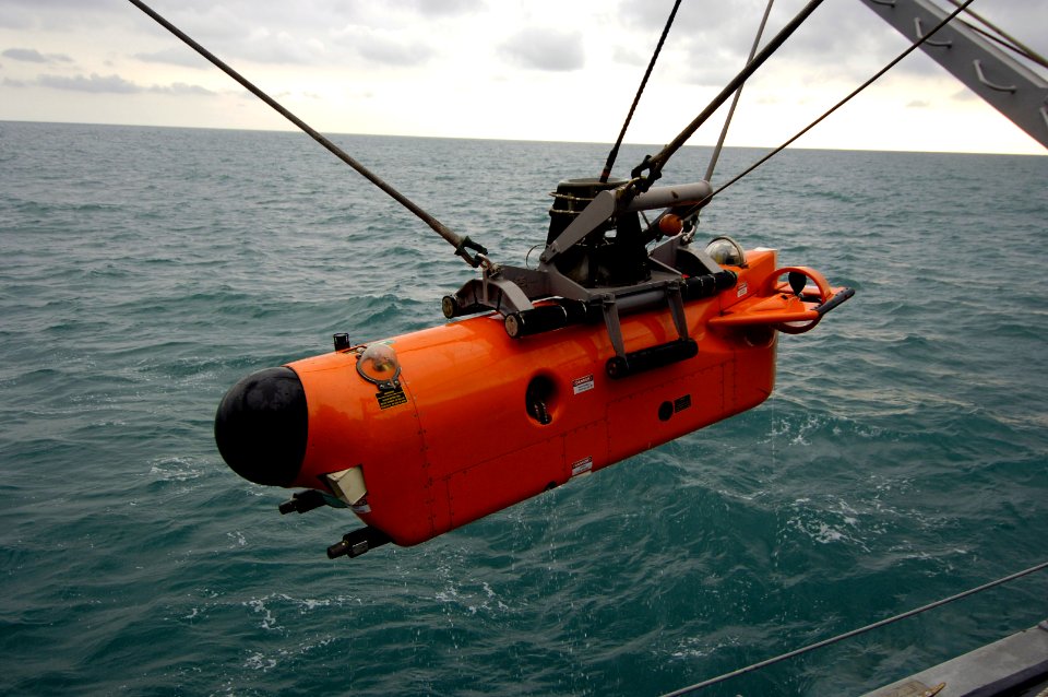 US Navy 061201-N-5555T-003 One of the Navy's Mine Neutralization Vehicles (MNV) is lowered over the side prior to a mine countermeasure exercise aboard USS Ardent (MCM 12)