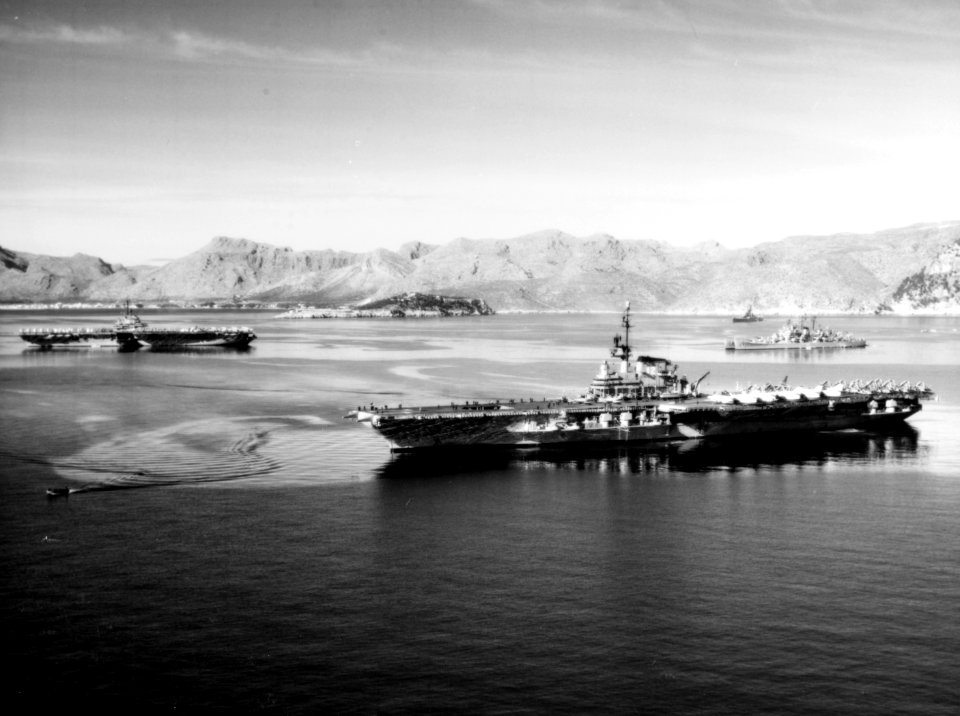 USS Franklin D. Roosevelt (CVA-42) and USS Randolph (CVA-15) anchored in Pollença Bay, Majorca, Spain, on 5 January 1958 (80-G-1034151)