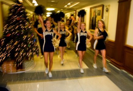 US Navy 061130-N-0696M-047 U.S. Naval Academy Midshipmen cheerleaders and band stir up excitement during a pep rally held in the halls of the Pentagon