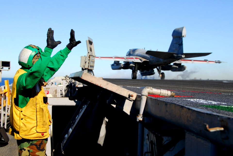 US Navy 061204-N-8158F-090 An EA-6B Prowler assigned to the Black Ravens of Tactical Electronic Warfare Squadron One Three Five (VAQ-135) launches from the flight deck aboard the nuclear-powered aircraft carrier U