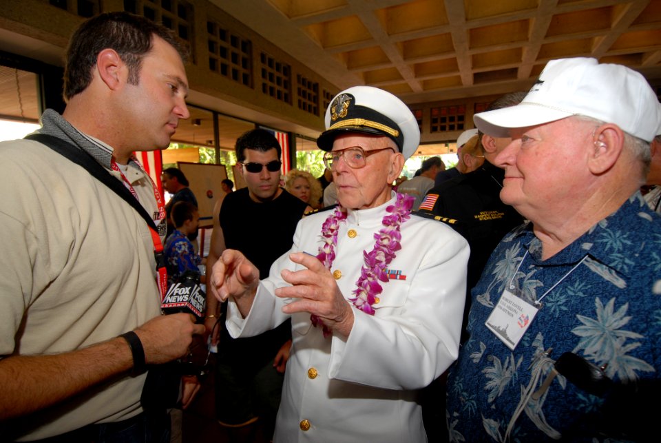 US Navy 061205-N-4965F-006 USS Arizona survivor, retired Lt. Cmdr. Joseph Langdell is interviewed by a FOX News correspondent during a visit to the USS Arizona Memorial Visitors Center