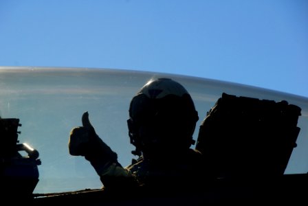 US Navy 061208-N-8158F-109 Commander, Strike Force Training Pacific, Rear Adm. Gerald R. Beaman, gives an enthusiastic thumbs up prior to launch from the flight deck of the nuclear-powered aircraft carrier USS Nimitz (CVN 68) photo