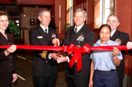 US Navy 061205-N-5307M-349 Naval Station Norfolk Commanding Officer, Capt. Loyd Pyle, and Commander, Navy region Mid-Atlantic, Rear Adm. Rick Ruehe, cut the ribbon at the grand opening ceremony