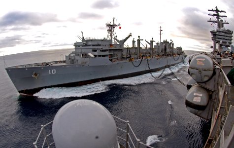 US Navy 061209-N-5484G-017 The Military Sealift Command (MSC) fast combat support ship USNS Bridge (T-AOE 10) performs a replenishment at sea with the nuclear-powered aircraft carrier USS Nimitz (CVN 68)