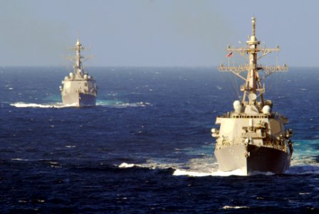 US Navy 061210-N-8158F-042 Guided-missile destroyer USS John Paul Jones (DDG 53) steams ahead of USS Chaffee (DDG 90) while participating in strike group exercises along with the nuclear-powered aircraft carrier USS Nimitz (CVN