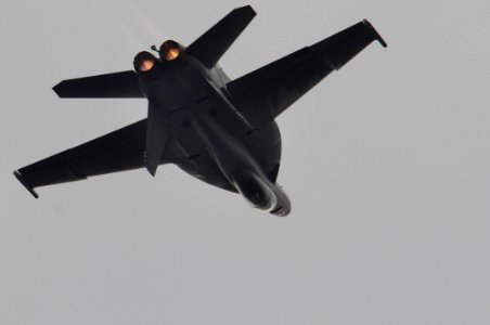 US Navy 061204-N-8591H-167 An F-A-18F Super Hornet assigned to the Strike Fighter Squadron One Zero Two (VFA-102) performs an aircraft roll as part of an air power demonstration aboard USS Kitty Hawk (CV 63)