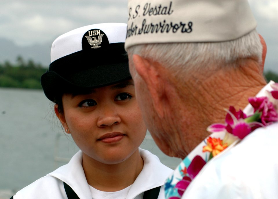 US Navy 061207-N-0879R-020 Airman Victoria Sheppard of the USS Arizona Detachment speaks with John Murphy, a Pearl Harbor survivor who was stationed aboard USS Vestal