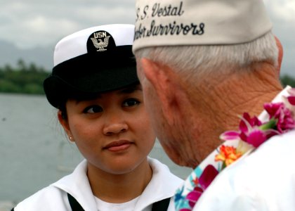 US Navy 061207-N-0879R-020 Airman Victoria Sheppard of the USS Arizona Detachment speaks with John Murphy, a Pearl Harbor survivor who was stationed aboard USS Vestal