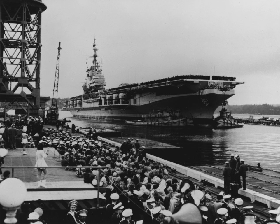USS Franklin D. Roosevelt (CVA-42) arrives at the Puget Sound Naval Shipyard in March 1954