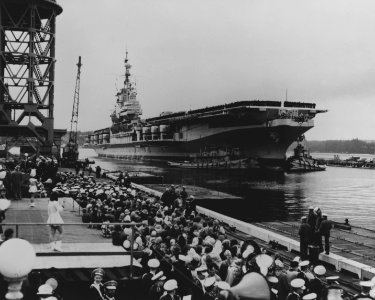 USS Franklin D. Roosevelt (CVA-42) arrives at the Puget Sound Naval Shipyard in March 1954