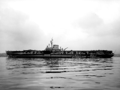 USS Franklin D. Roosevelt (CVA-42) with tugs c1954