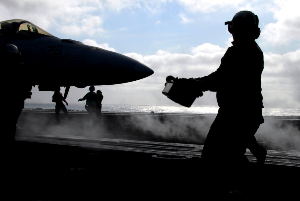 US Navy 061215-N-8158F-048 Airman Kyle Sanders confirms the weight of an F-A-18E Super Hornet prior to launch aboard the nuclear-powered aircraft carrier USS Nimitz (CVN 68)