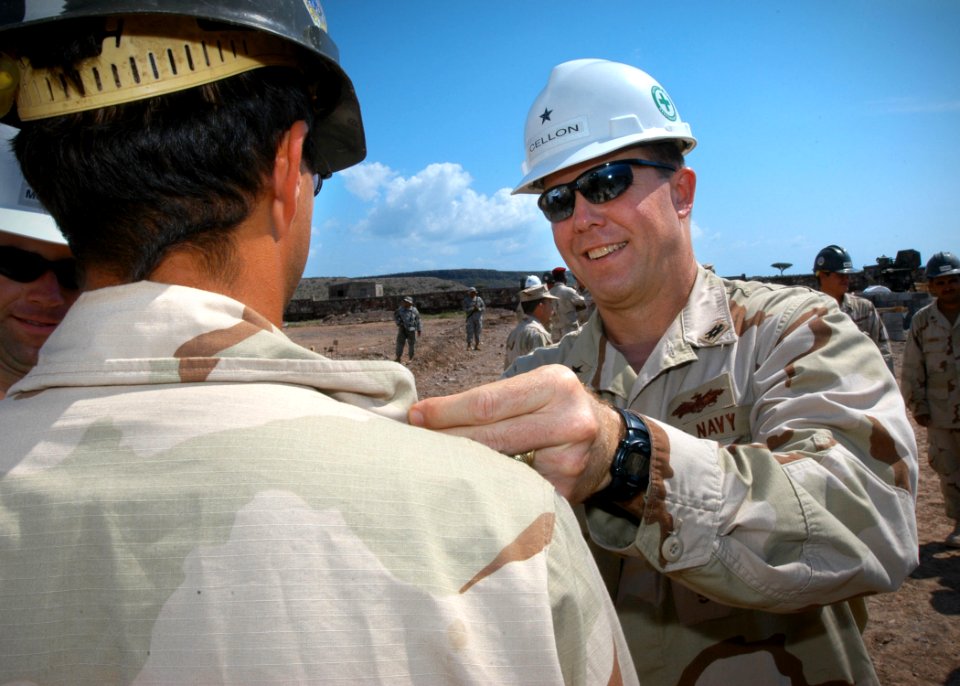US Navy 061209-N-1328C-428 While visiting the Naval Mobile Construction Battalion Five (NMCB-5) Tadjoura Primary school project, Commander, U.S. Naval Facilities Engineering Command Rear Adm. Richard E. Cellon frocked three Sea