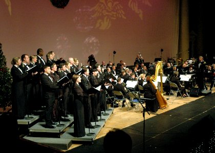 US Navy 061216-N-0773H-025 Commanding Officer-Leader of the U.S. Navy Band, Capt. Ralph M. Gambone, conducts the Concert Band and Sea Chanters chorus as they sing photo