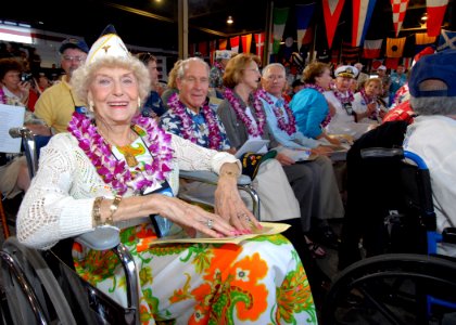 US Navy 061207-N-4965F-004 World War II nurse and Pearl Harbor survivor wait for the commencement of a joint U.S. Navy-National Park Service ceremony commemorating the 65th Anniversary of the attack on Pearl Harbor