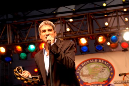 US Navy 061219-N-2959L-102 2006 American Idol winner Taylor Hicks performs for the crowd during a holiday concert for service members and their families aboard the Nimitz-class aircraft carrier USS Ronald Reagan (CVN 76)