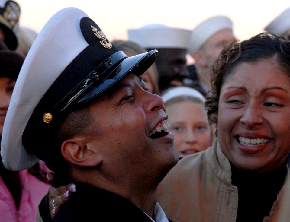 US Navy 061219-N-2959L-004 Chief Storekeeper Charles Tugaoen enjoys a holiday concert aboard the Nimitz-class aircraft carrier USS Ronald Reagan (CVN 76)
