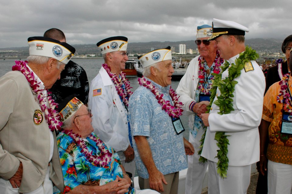 US Navy 061207-N-9076B-175 Commander U.S. Pacific Fleet Adm. Gary Roughead talks with Pearl Harbor survivors after taking part in the joint U.S. Navy-National Park Service ceremony commemorating the 65th Anniversary of the atta