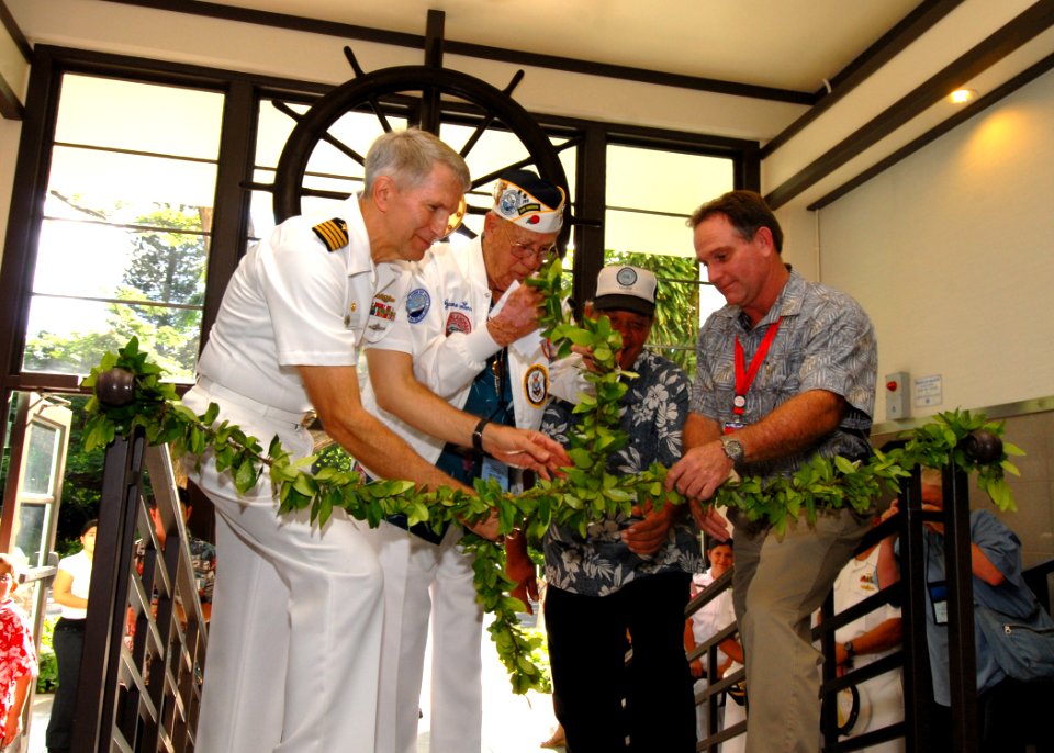 US Navy 061206-N-4965F-019 The renovation and dedication honors the historic tie between the Pearl Harbor Shipyard workers who aided in the rescue of 32 Sailors from the capsized ship in the days following Dec. 7, 1941