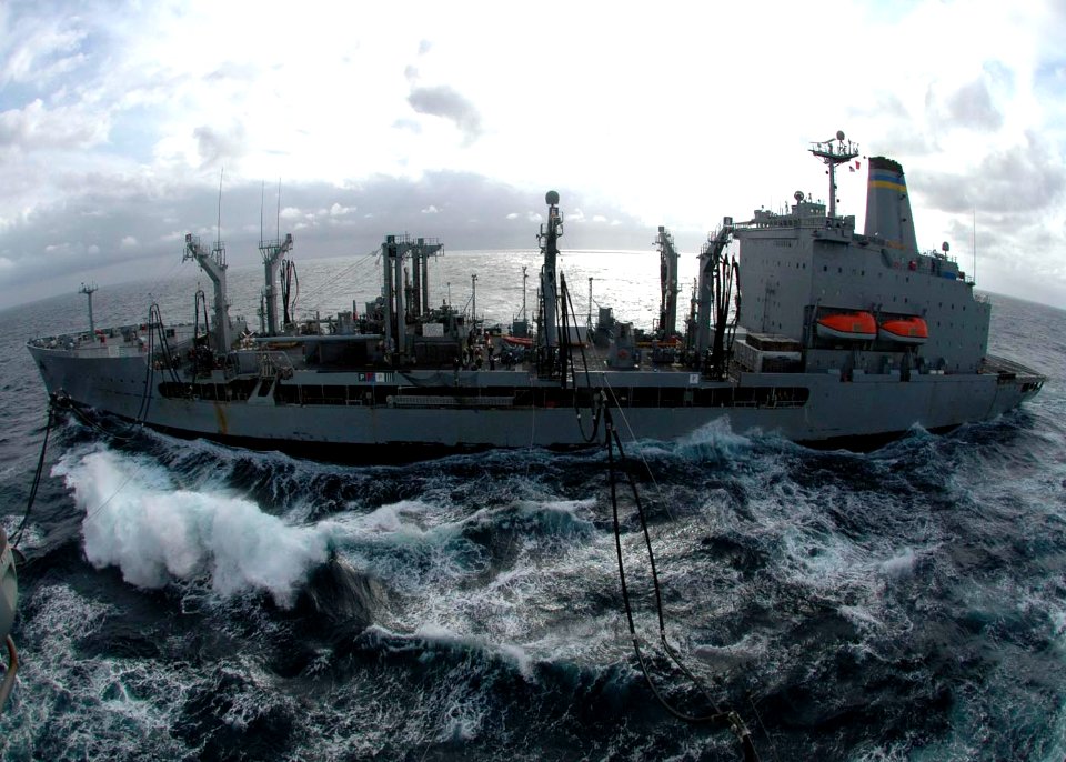US Navy 061212-N-8547M-001 Fleet replenishment oiler USNS John Lenthall (T-AO 189) performs replenishment at sea (RAS) with amphibious assault ship USS Saipan (LHA 2)