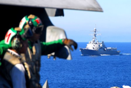 US Navy 061208-N-8158F-003 The guided-missile destroyer USS Chaffee (DDG 90) steams alongside the nuclear-powered aircraft carrier USS Nimitz (CVN 68)