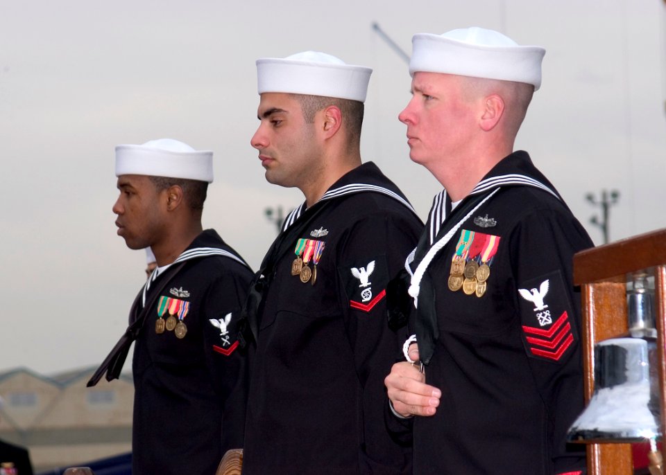US Navy 061212-N-2716P-001 Sailors of the guided-missile destroyer USS Stethem (DDG 63) honor guard stand by to pipe aboard members of the official party during Stethem's change of command ceremony
