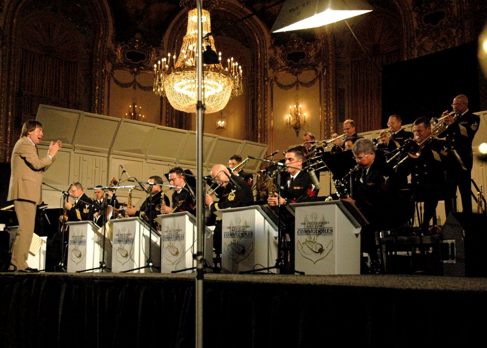 US Navy 061221-N-0773H-096 Famed jazz trombonist Bill Watrous on stage with the U.S. Navy Band Commodores jazz ensemble during an evening concert at the Midwest Band and Orchestra Conference