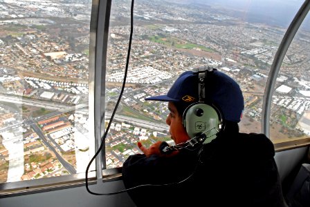 US Navy 061216-N-4774B-322 A 12-year-old patient at Naval Medical Center San Diego, observes the San Diego area from aboard the SANYO blimp gondola
