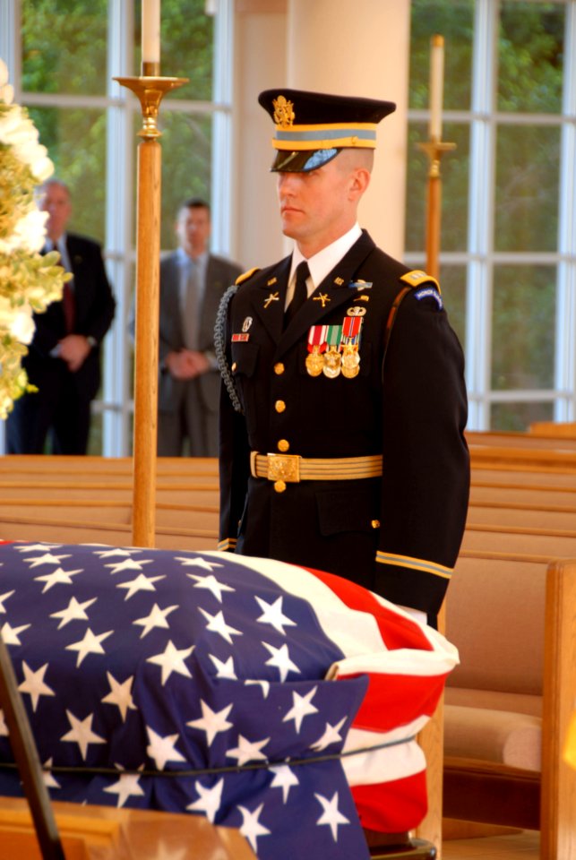 US Navy 061229-A-0607L-004 Captain Christopher Brooke from 3rd U.S. Infantry Regiment, also known as The Old Guard, stands at attention near the casket of former President Ford