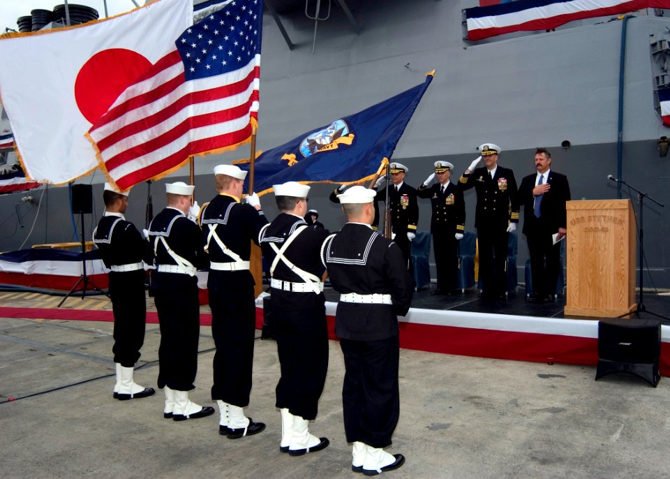 US Navy 061212-N-2716P-004 The honor guard assigned to USS Stethem (DDG 63) parades the colors during the change of command ceremony held onboard Naval base Yokosuka