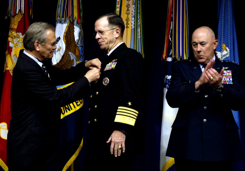 US Navy 061213-D-7203T-276 Secretary of Defense Donald H. Rumsfeld presents an award for Transformation Support for Non-Traditional Missions