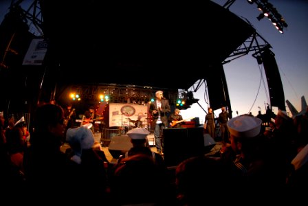US Navy 061219-N-2959L-143 2006 American Idol winner Taylor Hicks performs for the crowd during a holiday concert for service members and their families aboard the Nimitz-class aircraft carrier USS Ronald Reagan (CVN 76)