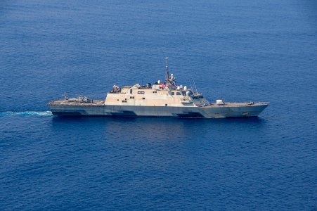 USS Fort Worth transits into formation during a photo exercise as a part of Exercise Malabar 2015
