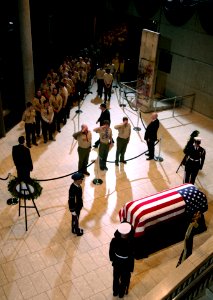 US Navy 070102-F-8535W-276 The casket of former President Gerald R. Ford is saluted during a memorial and repose ceremony at the Gerald R. Ford Museum in Grand Rapids
