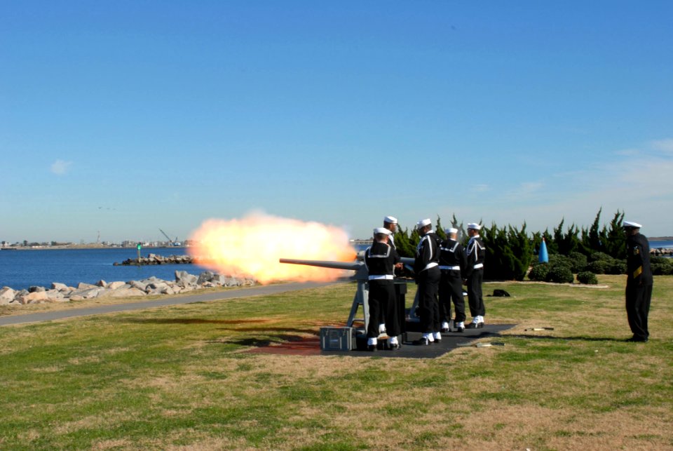 US Navy 070103-N-5459S-030 The Navy Munitions Command, detachment Sewells Point, performs a 21-gun salute at Iowa Point, located aboard Naval Station Norfolk