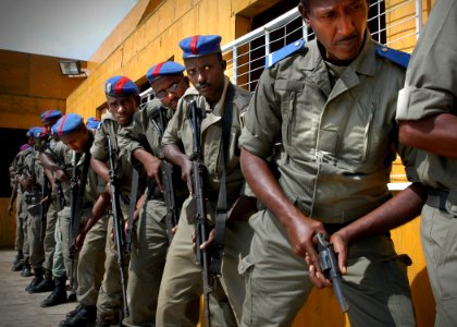 US Navy 061221-N-1328C-044 Students from the special brigade of the Djiboutian national police prepare to enter and clear a building of enemy forces during a three-day training on a range of topics from basic weapons procedures photo