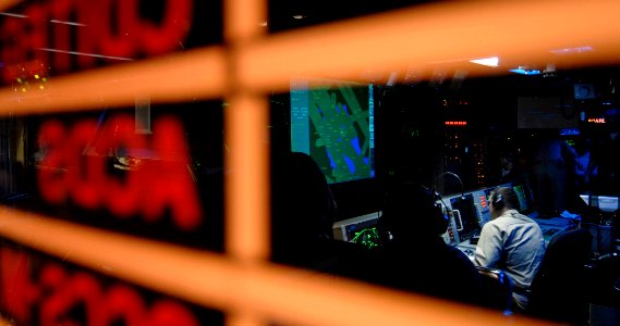 US Navy 061216-N-5345W-044 Sailors work at their consoles while manning the Advanced Combat Direction System (ACDS) in the Combat Direction Center (CDC) aboard the Nimitz-class aircraft carrier USS Harry S. Truman (CVN 75)